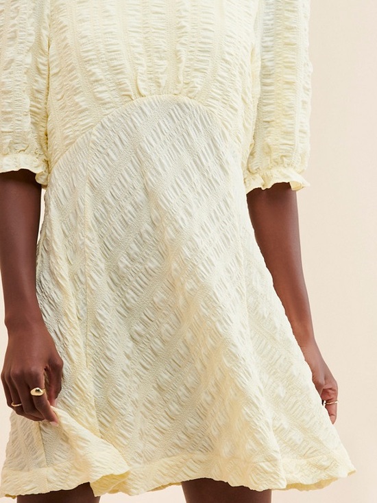 En Saison Dresses & Skirts - En Saison butter Yellow Textured Mini Dress
